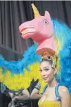  ??  ?? Representi­ng Sweden, Vicky Tran brought the unicorn along as her national costume.