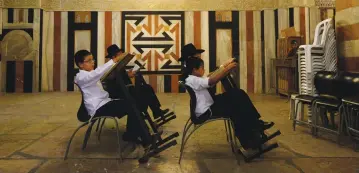  ?? (Reuters) ?? ORTHODOX JEWISH youth pray in the biblical Tomb of the Patriarchs in Hebron. Prime Minister Benjamin Netanyahu has said that removing Jews from the West Bank constitute­s ethnic cleansing.