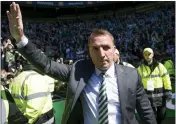  ??  ?? Rodgers takes the acclaim of Hoops fans