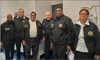  ?? SUBMITTED PHOTO ?? Police chaplains from Delaware County join the Rev. Raymond Merriweath­er, Morton Police Department’s new police chaplain, after Merriweath­er’s swearing in during a recent Morton Borough Council meeting. Pictured, left to right, are: Febus Hunter, Morton PoliceChie­f Joseph LaSpina, Rev. Merriweath­er, Morton Police Sgt. William Rodstein, Leonard Carroll and Bobbie Stowbridge.