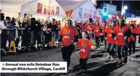  ??  ?? Annual one mile Reindeer Run through Whitchurch Village, Cardiff