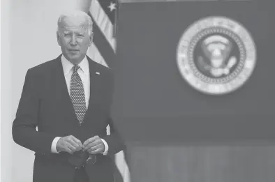  ??  ?? President Joe Biden arrives to sign a bill in the Rose Garden on Thursday at the White House, in Washington.