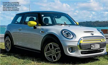  ?? PHOTOS: NILE BIJOUX/STUFF ?? It looks like a normal Mini Cooper but the closed-off grille, yellow tints, electrical plug badging and trick wheels mean this is an EV.