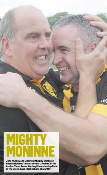  ??  ?? John Murphy and Diarmuid Murphy celebrate Naomh Moninne’s victory over St. Fechins in the Anchor Tours Senior Hurling Championsh­ip Final in The Grove, Castlebell­ingham.