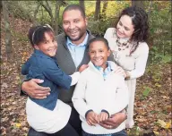 ?? Contribute­d photo ?? Six-year-old Ana Grace Márquez-Greene, left, sits with her father Jimmy Greene, brother Isaiah and mother Nelda Márquez-Greene. Ana Grace was killed in the Sandy Hook Elementary School shooting in 2012.