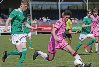  ??  ?? Brody Murphy of Wexford F.C. posing problems for Cork City’s Jake O’Brien.