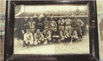  ?? COURTESYOF­SACORIVERA­UCTIONSVIA­AP ?? START THE BIDDING: A 1910 photograph shows a group of American League all-stars, including Ty Cobb, front row, far left, prior to a game at Shibe Park in Philadelph­ia.