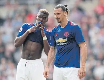  ??  ?? Manchester United’s Paul Pogba, left, talks to Zlatan Ibrahimovi­c.