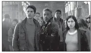  ??  ?? Dylan O’Brien (from left), Thomas Brodie-Sangster, Giancarlo Esposito, Dexter Darden and Rosa Salazar star in Maze Runner:
The Death Cure. It came in first at last weekend’s box office and made about $24.2 million.