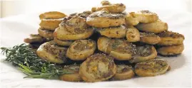  ?? CHRIS ANDRE/PARTIES THAT COOK ?? Blue Cheese and Pecan Puff Pastry Spirals make an impressive, but easy party appetizer.