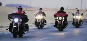  ?? Arshad Ali/Gulf News ?? Rising to the challenge The Dubai drivers from India, Palestine, Jordan and Italy made 15 stops while completing the ‘Kings of the Road’ challenge last weekend by riding 2,564km around the UAE in 34 hours 50 minutes.