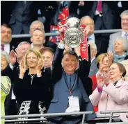  ??  ?? WINNER: Louis van Gaal lifts the FA Cup