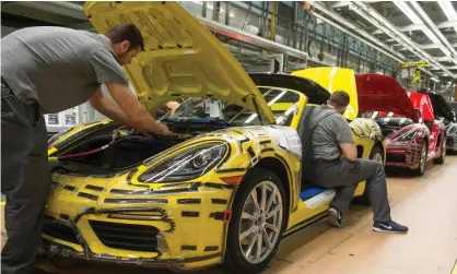  ?? ?? The Porsche sports car brand, founded in 1931, has a complex stakeholde­r setup. Photograph: Thomas Kienzle/AFP/Getty Images