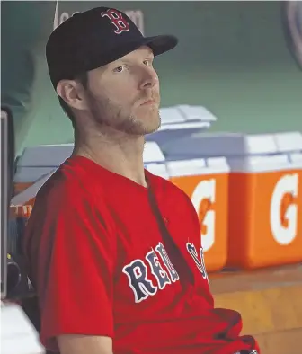  ?? STAFF PHOTO BY STUART CAHILL ?? ZERO TO SHOW FOR IT: Chris Sale sits in the Red Sox dugout during the seventh inning last night at Fenway. Sale allowed only one run through eight innings, but got no offensive support in a 1-0 loss to the White Sox.