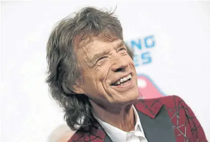  ?? AFP ?? Un papá genial. Jagger tiene hijos de todas las edades: la mayor tiene 45 años... y el menor, un día de vida.