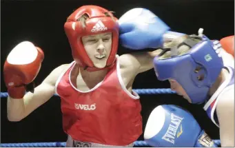  ??  ?? Jack Robinson of Wexford C.B.S. (left) in action against Eoin McGrath (Ryston) in the All-Ireland Boy 4 36 kg. boxing final.