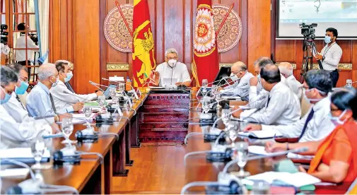  ??  ?? President Gotabaya Rajapaksa at a meeting with senior Central Bank officials led by Governor W.D. Lakshman on Tuesday. Picture courtesy President’s media unit.