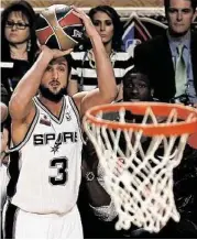  ?? Bill Haber / Associated Press ?? The basket looked enormous for the Spurs’ Marco Belinelli as he was winning the 3-point contest.