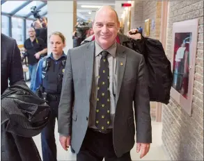  ?? CP PHOTO RYAN REMIORZ ?? Train driver Thomas Harding smiles as he leaves the courtroom in Sherbrooke, Que Friday after being found not guilty on the ninth day of deliberati­ons.