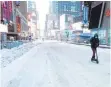  ?? FOTO: TIMOTHY A. CLARY/AFP ?? Schneebede­ckt war auch der Times Square in New York.