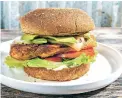  ?? REY LOPEZ/FOR THE WASHINGTON POST ?? This chipotle chicken sandwich with avocado skips the deep fryer.