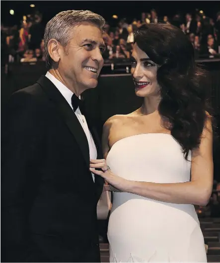  ?? BERTRAND GUAY/GETTY IMAGES/FILES ?? George Clooney and his wife, lawyer Amal Clooney, are expecting twins this summer. They should anticipate challenges, both with the pregnancy and with raising multiple babies.