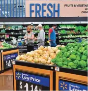  ?? (AFP) ?? A file photo shows people shopping at a store in Rosemead, California