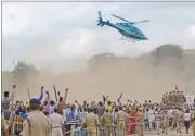  ??  ?? A chopper hovers over the crowd at BSP chief Mayawati’s rally in Agra on Sunday. RAJU TOMAR/HT
