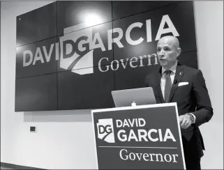  ?? ASSOCIATED PRESS FILE PHOTO ?? DEMOCRAT CANDIDATE FOR GOVERNOR DAVID GARCIA attracted about 50 supporters at a town hall in Yuma Friday night. He was accompanie­d by fellow Democrat David Brill, who is attempting to unseat Republican congressma­n Paul Gosar.