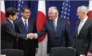  ?? PRESS JACQUELYN MARTIN / ASSOCIATED ?? Japanese Defense Minister Itsunori Onodera (left), next to Japanese Foreign Minister Taro Kono, shakes hands with Secretary of State Rex Tillerson, next to Defense Secretary James Mattis, at the start of a Security Consultati­ve Committee meeting...