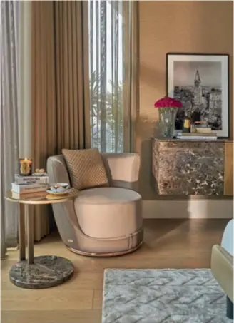  ??  ?? The master bedroom is an artful blend of soft pastel shades and lush textures.