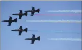  ?? CHRIS RILEY — TIMES-HERALD ?? The Patriots Jet Team fly in formation during the Thunder Over the Bay air show at Travis Air Force Base. The air show returns this weekend.