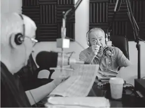  ?? Joe Amon, The Denver Post file ?? Joe Williams, left, listens to Irv Brown, longtime college referee and sports radio talk-show host, during their show in 2013.