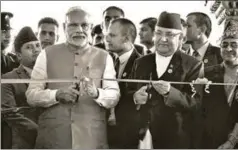  ?? PTI ?? Prime Minister Narendra Modi with Nepal PM KP Sharma Oli, August 31, 2018. India should demonstrat­e that it can deliver on its promises as well as China does, if not better