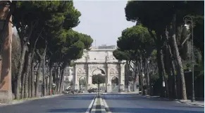  ?? (Alberto Lingria/Reuters) ?? EMPTY STREETS in Rome are seen deserted yesterday as Italians stay home as part of a lockdown against the spread of coronaviru­s disease (COVID-19).