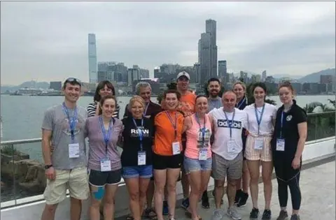  ??  ?? The Arklow rowers who competed in the World Rowing Coastal Championsh­ips in Hong Kong along with their backroom team.