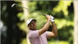  ?? STEVEN PASTON — THE ASSOCIATED PRESS ?? Charles Schwartzel plays a shot during day two of the LIV Golf Invitation­al Series at the Centurion Club, St. Albans, England, in Friday.