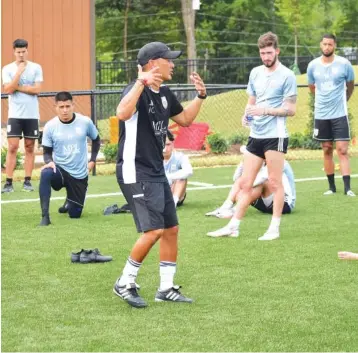  ?? STAFF FILE PHOTO BY PATRICK MACCOON ?? Jimmy Obleda, center, made his debut as coach of the Chattanoog­a Red Wolves Sc with a 2-2 draw on the road last Saturday, but now the USL League One team will make its 2020 home debut by playing its first match at CHI Memorial Stadium against FC Tucson. Limited attendance will be permitted for today’s 5 p.m. match in East Ridge.