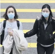  ?? PHOTO D’ARCHIVES ?? Deux femmes masquées dans une rue de Hong Kong, ville où le premier cas de réinfectio­n a été confirmé, le 24 août.