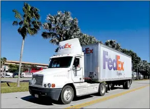  ?? AP/ALAN DIAZ ?? Memphis-based FedEx Corp.’s third-quarter earnings, released Tuesday after markets closed, missed analysts’ estimates.