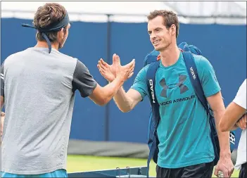  ??  ?? Andy Murray played with Cameron Norrie on Friday
