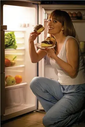  ?? Photo: iStock ?? DOUGHNUT DO IT: Think twice before reaching for high GI snacks if you get the munchies at night. Instead, try healthier options such as fruit or yoghurt.