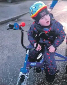  ??  ?? The Tomcat Trike increases Cooper’s quality of life as it gives him access to therapeuti­c cycling.