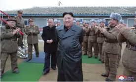  ?? Photograph: ௉ળ௪৶ऀ/AP ?? North Korean leader Kim Jong-un, in his new jacket, surrounded by a military unit