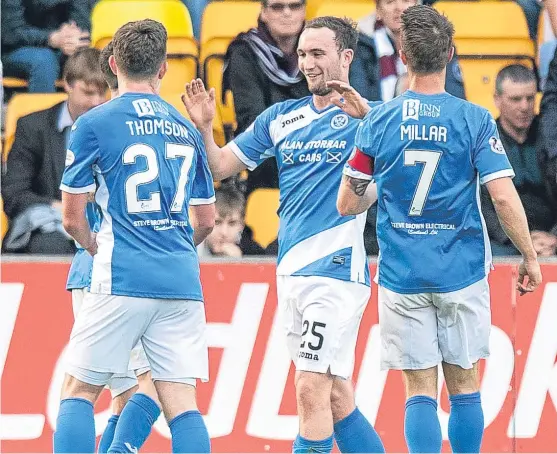  ?? Picture: SNS Group. ?? Chris Kane celebrates his winner for Saints with Craig Thomson and Chris Millar.