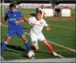  ?? TANIA BARRICKLO — DAILY FREEMAN FILE ?? Stockade's Juan Gatti battle for ball during regular-season match at Dietz Stadium.