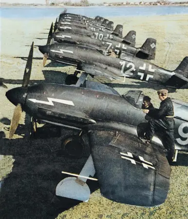  ??  ?? This propaganda photo was staged and colorized to give the impression that there was a new Luftwaffe fighter in the game. The airplane had excellent speed and was light years easier than the Bf 109 to land, but it is rumored that politics got in its way. (Photo via EN Archive)