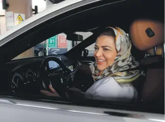  ?? Reuters ?? Psychologi­st Dr Samira Al Ghamdi drives to work in Jeddah yesterday