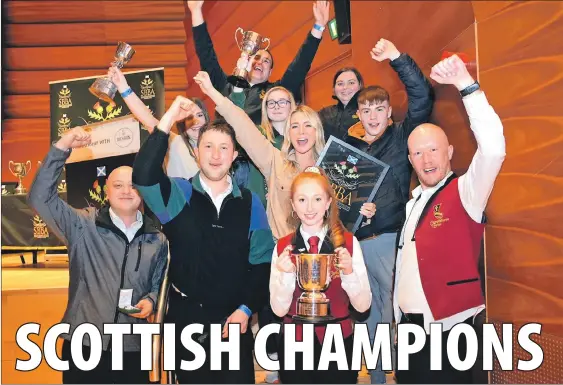  ?? ?? Conductor Stephanie Kennedy and some members of Campbeltow­n Brass celebratin­g their triumph at the Scottish Regional Championsh­ips – most players had to begin the long return journey to Campbeltow­n on the bus before the results were announced.