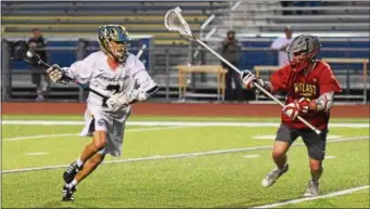  ?? AUSTIN HERTZOG - DIGITAL FIRST MEDIA ?? Spring-Ford’s Brad Hart (2) dodges as West Chester East’s Ryan Cassidy defends during a District 1-3A playoff game Thursday at Spring-Ford.